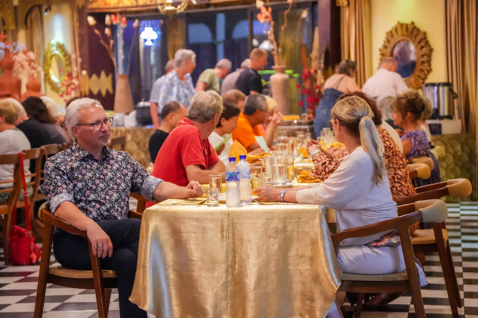 Guests dining together before a performance