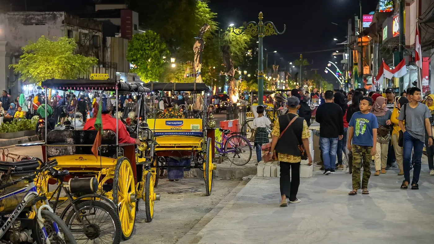 Malioboro Street and horse-drawn carriages at night