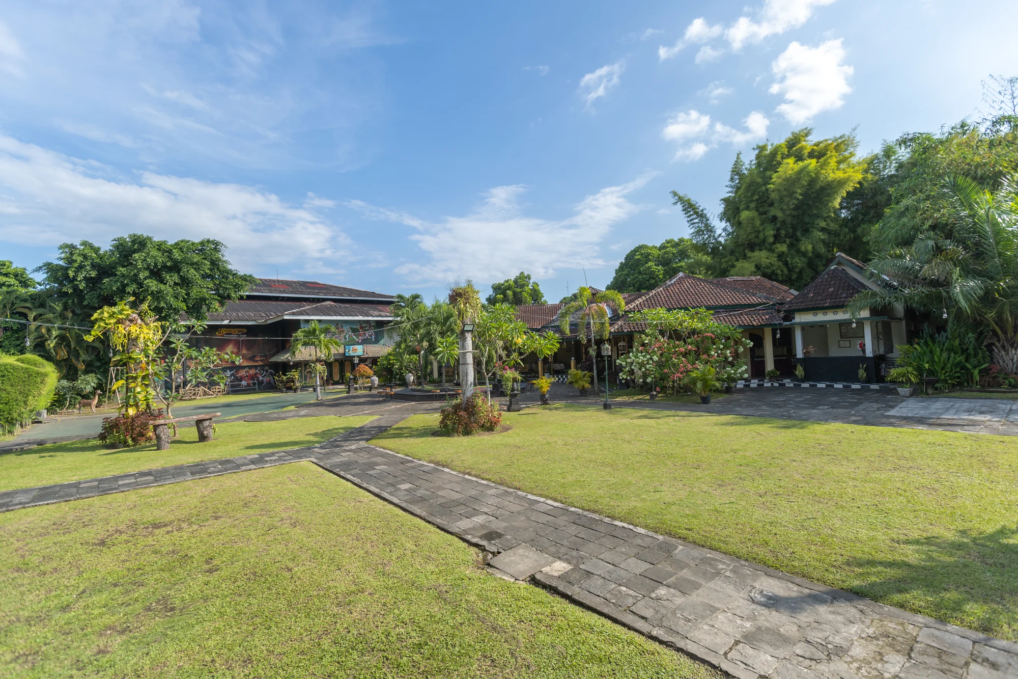 Garden paths and traditional Joglo pavilions in the complex