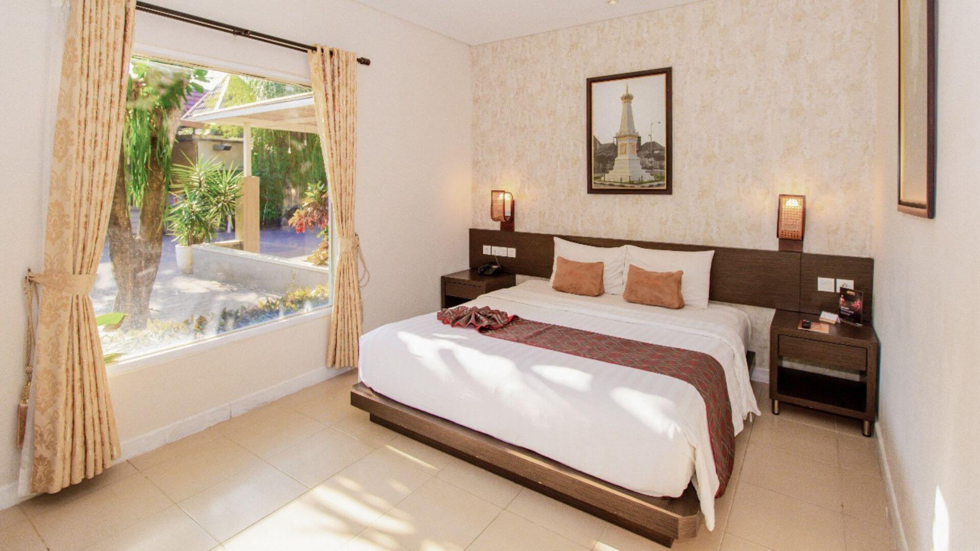 kamar deluxe tasneem hotel